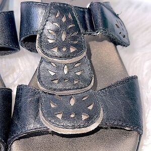 Clark’s black slide sandals with Velcro adjustment